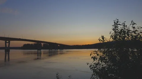 Traffic flowing across bridge during sunset Stock Footage 112364852