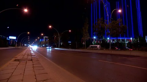 Traffic flowing at night fixed Video stock 99289717