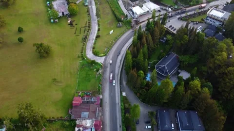 Traffic Flowing Through Winding Roads in Berastagi Town Video stock 311491208