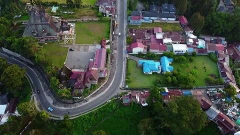 Traffic Flowing Through Winding Roads in Berastagi Town Video stock 311491237