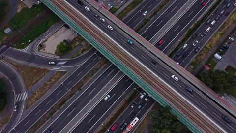 Traffic flows on a busy highway interchange in an urban area Stock Footage 344536739