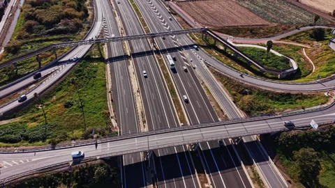 Traffic flows on highways in Spain during a sunny day Stock Footage 327647526
