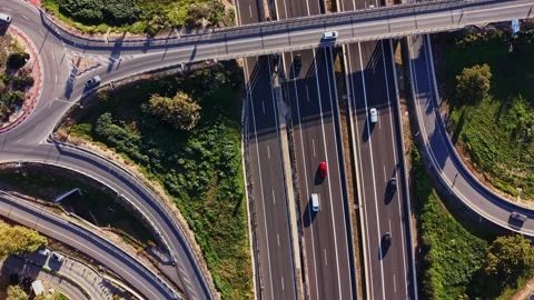 Traffic flows on highways in Spain during daytime hours Stock Footage 327649104