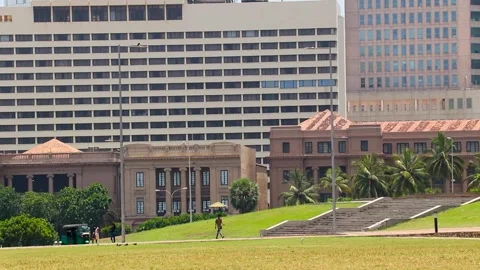 Traffic flows by iconic landmarks in Colombo, Sri Lanka. Stock Footage 255673875