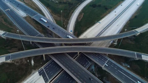 Traffic flows smoothly through strategically designed transport interchange Stock Footage 268436009