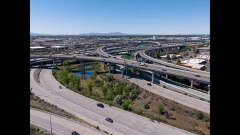 Traffic flows on the Spaghetti Bowl highway interchange in Salt Lake City Stock Footage 341674527