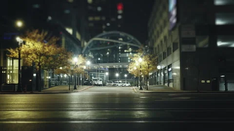 Traffic flows through downtown Salt Lake City at night with vibrant lights Stock Footage 310298061