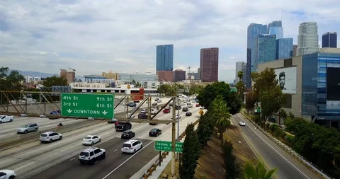 Traffic on Freeway Sign in view Stock Footage 114022844