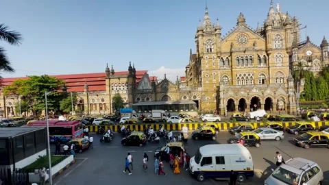 Traffic in front of Chhatrapati Shivaji Maharaj Terminus in Colaba, Mumbai. Stock Footage 252109776