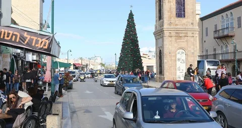 Traffic front of christmas tree on the square of tower clock Stock Footage 104271267