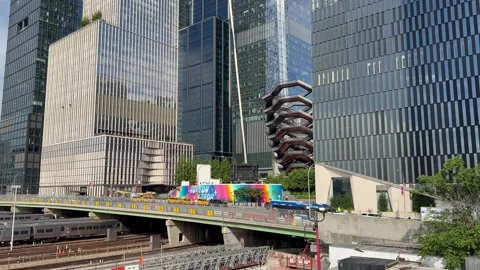 Traffic in front of Hudson Yards and Vessel structure. New York City Stock Footage 336502838