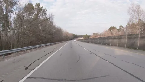 Traffic going up a hill on the highway rear view Stock Footage 149333319