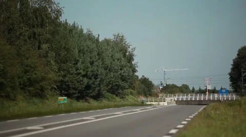 Traffic going under trainoverpass Stock Footage 39018275