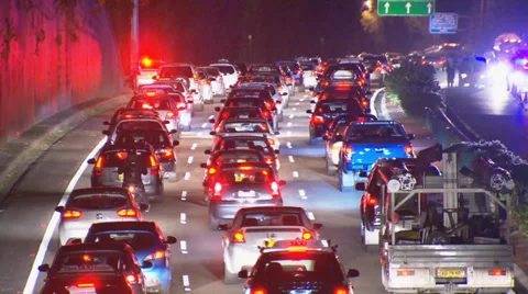 Traffic gridlock on Sydney freeway at night Stock Footage