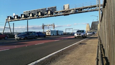 Traffic on the harbor bridge, UHD handheld view cars driving over the harbor  Stock Footage 87627610