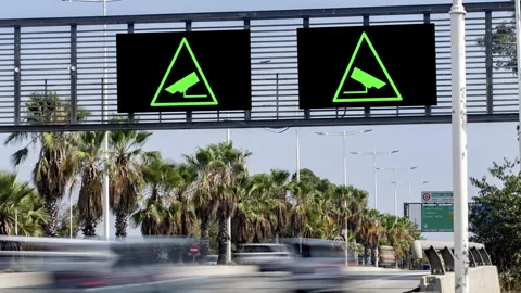 Traffic on highway and cctv on screen Stock Footage 315314304