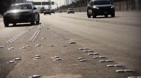 Traffic on a highway. Backlighting Tilt Shift Stock Footage 60061085