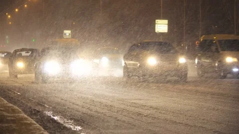Traffic on the highway during intense snow storm Stock-Footage 83540459