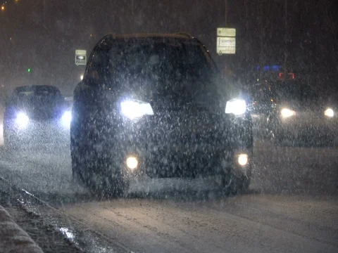 Traffic on the highway during intense snow storm. Stock Footage 83540765