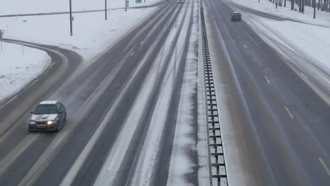 Traffic on highway during winter blizzard. Snowstorm on the road. Stock Footage 262624613