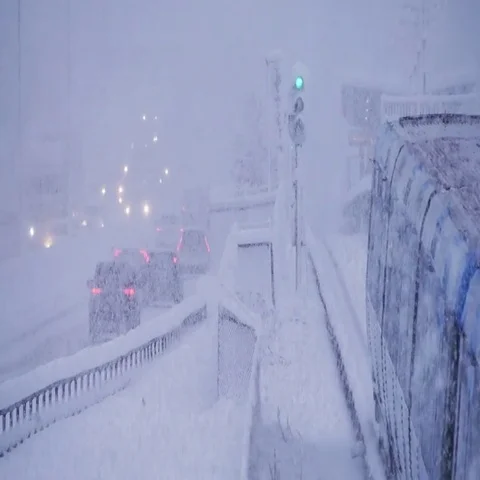 Traffic on highway during winter snow storm Stock Footage 69493812
