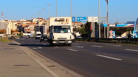 Traffic on a highway entering town of Split. Reduced traffic during early mor Stock Footage 129112519