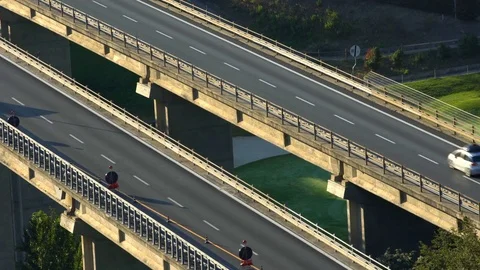 Traffic on the highway in the mountains, sunset. Stock Footage 72514501