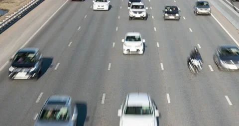 Traffic on the highway. Multilane road with moving cars during daylight Vídeo Stock 154220174