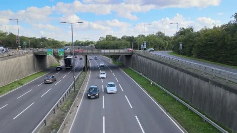 Traffic on highway multilevel intersection in town outskirts Stock Footage 164827971