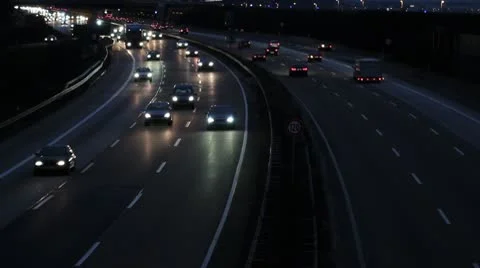 Traffic on highway at night Stock Footage