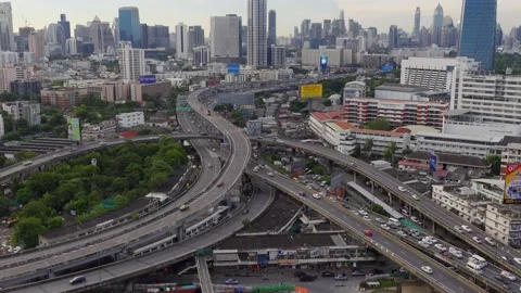 Traffic on the highway road intersection in Bangkok, Thailand from day to night. Video stock 150379314