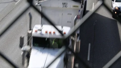 Traffic Highway - Through Fence Stock Footage 79809486