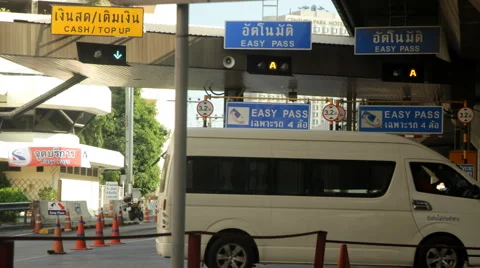 Traffic at Highway Toll Booth Stock Footage 59718477