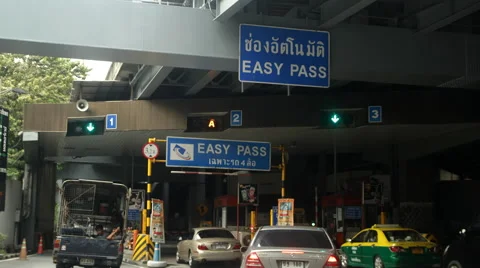 Traffic at Highway Toll Booth Stock Footage 60239197