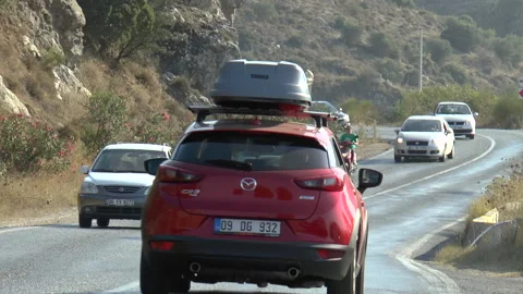 Traffic On A Hillside Road Slow Motion Stock Footage 144328869