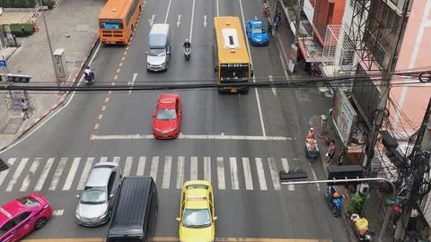 Traffic at an Intersection in Bangkok, Thailand Stock Footage 121892328