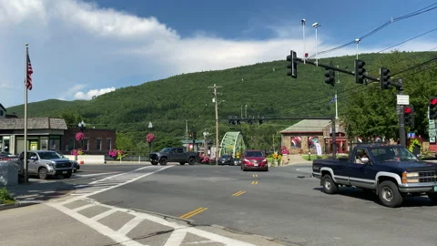 Traffic at the intersection of Bridge Street in Brattleboro Vermont Video stock 144788433
