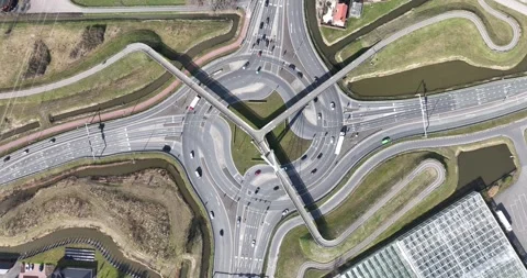 Traffic intersection, De snelbinder, Naaldwijk, The Netherlands, multiple lane Stock Footage 304269864