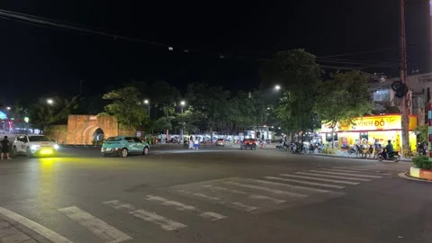 Traffic intersection at night near ancient citadel. Stock Footage 346236434