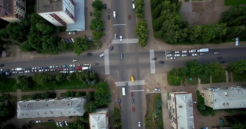 Traffic at the intersection at the summer day. Stock Footage 103581384