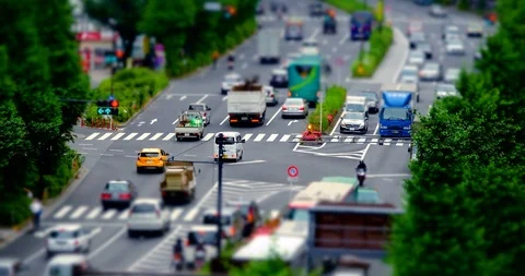 Traffic intersection in Tokyo tilt shift time lapse Video stock 111149424
