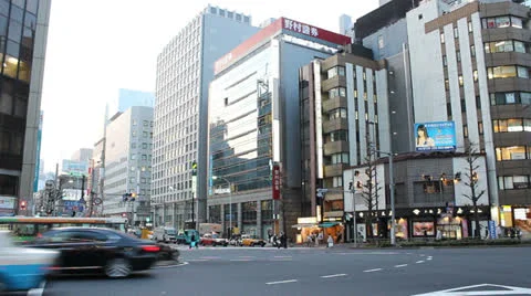 Traffic at intersection in Tokyo's Ginza district. Stock Footage 25821685