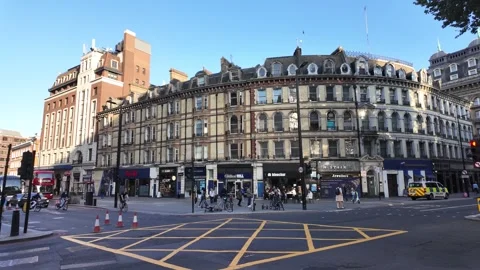 Traffic on the Intersection of Victoria St &amp; Buckingham Palace Rd Stock Footage 313697952