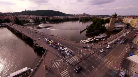 Traffic Intersection at Vltava river in Prague from above – wide shot Stock Footage 82707180