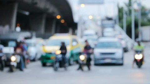 Traffic at intersection while waiting for traffic lights at twilight. Stock Footage 90180379