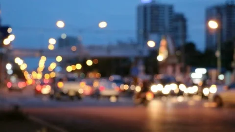 Traffic at intersection while waiting for traffic lights at twilight. Stock Footage 90181032