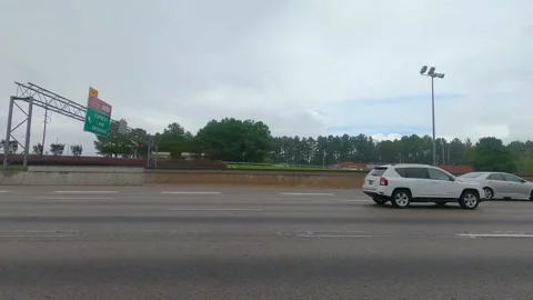 Traffic on Interstate 285 side view Stock Footage 143370363