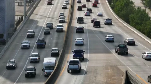 Traffic on interstate freeway highway. Rush hour in Texas. Long aerial Stock Footage 201594368