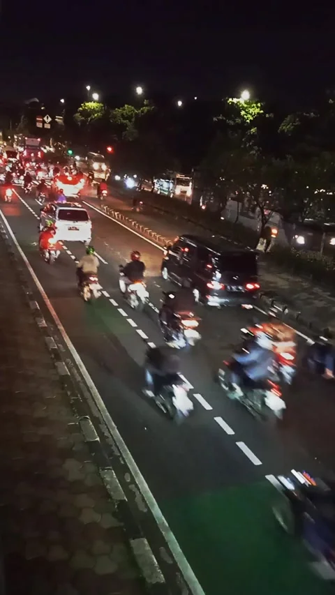 Traffic in Jakarta at night Stock Footage 236026705