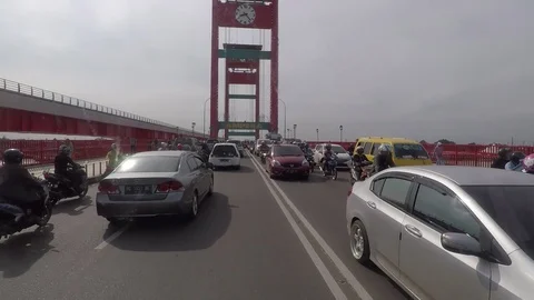Traffic jam in Ampera Bridge in Palembang Indonesia Stock Footage 120100903